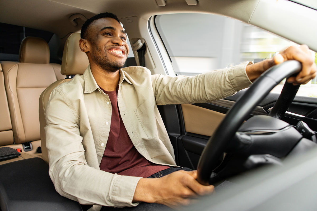 African American driving road trip